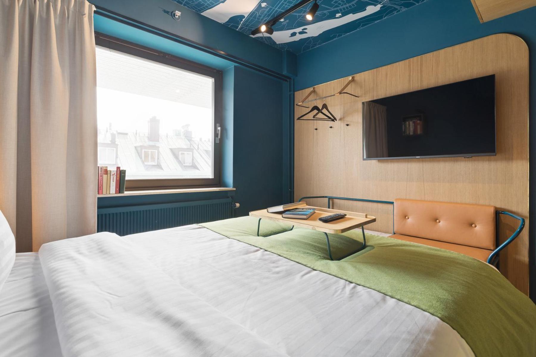 Kamer met Queensize Bed op de 6e Verdieping